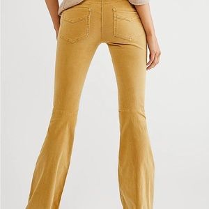 Free People BRAND NEW!!! stretchy flared corduroy pants, pull on, size 25.